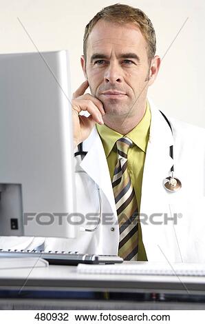 Male doctor thinking View Large Photo Image Stock Image - Male doctor thinking . Fotosearch
