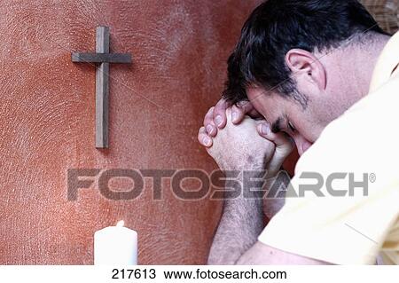 Man praying View Large Photo Image Stock Image - Man praying . Fotosearch
