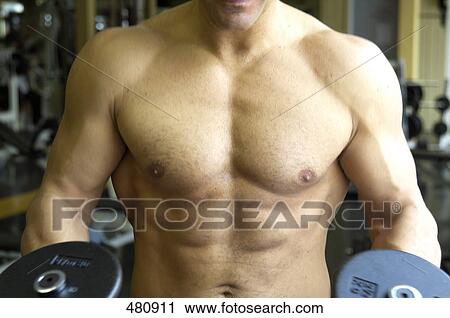 Stock Image - Man with six-pack training muscles . Fotosearch