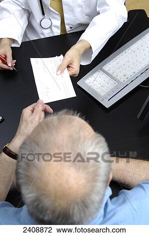 Stock Image - Mid section view of female doctor giving a prescription to patient . Fotosearch