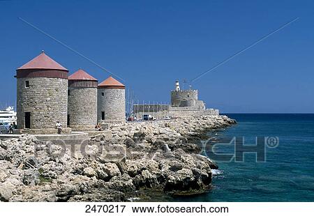 Stock Photo - Mills at harbor, Mandraki Harbor, Dodecanese Islands, Aegean Islands, Rhodos, Kallithea, Greece . Fotosearch