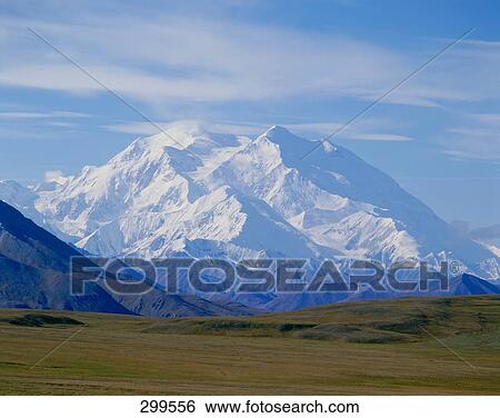 Stock Photograph - Mountains against sky, Denali National Park, Mt Mckinley, Alaska, USA . Fotosearch