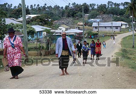Stock Photo - Native people walking on village street, Tonga . Fotosearch