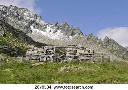 Picture - Old ruins of farmhouse on landscape, Trentino-Alto Adige, Italy . Fotosearch