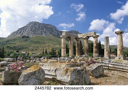 Stock Image - Old ruins of temple, Temple of Apollo, Portara, Naxos Island, Cyclades, Aegean Islands, Greek Islands, Greece . Fotosearch