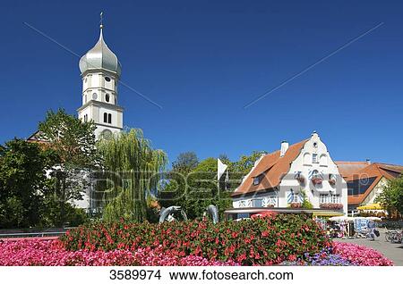 Picture - Parish chuch and castle, Wasserburg am Bodensee, Schwaben, Germany, Europe . Fotosearch