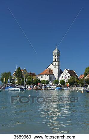 Parish church and castle, Wasserburg am Bodensee, Schwaben, Germany, Europe View Large Photo Image Stock Photo - Parish church and castle, Wasserburg am Bodensee, Schwaben, Germany, Europe . Fotosearch