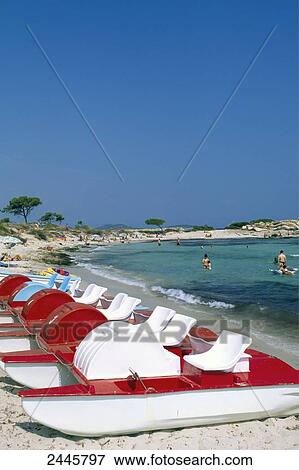 Stock Photo - Pedal boats on beach, Vourvourou, Sithonia, Halkidiki Prefecture, Greece . Fotosearch
