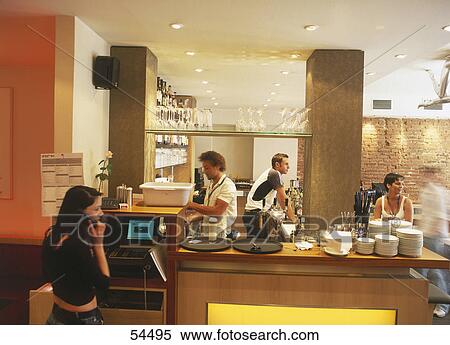 Stock Photography - People inside restaurant . Fotosearch