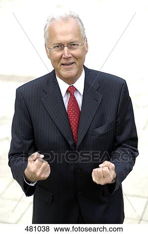 Portrait of businessman making fist View Large Photo Image Stock Photo - Portrait of businessman making fist . Fotosearch