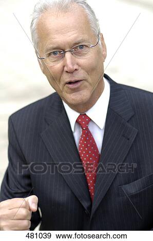 Portrait of businessman making fist View Large Photo Image Stock Photo - Portrait of businessman making fist . Fotosearch