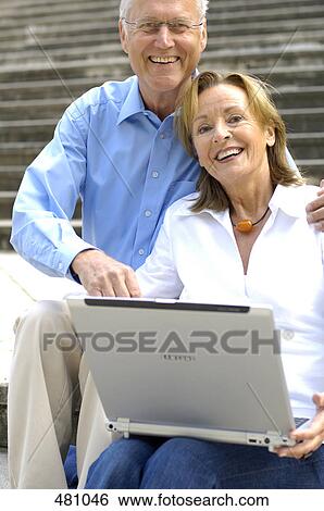 Portrait of couple smiling View Large Photo Image Stock Photograph - Portrait of couple smiling . Fotosearch