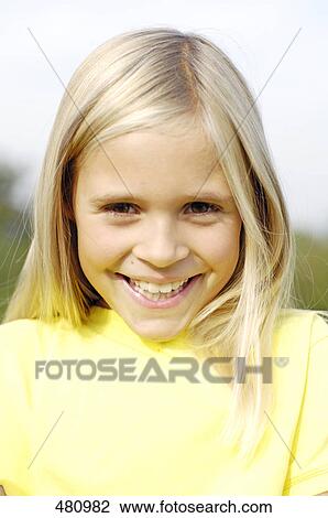 Stock Image - Portrait of girl smiling . Fotosearch