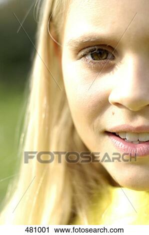 Stock Image - Portrait of girl smiling . Fotosearch