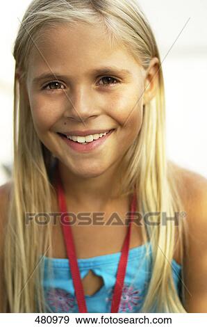Stock Photo - Portrait of girl smiling . Fotosearch