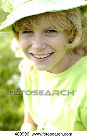 Stock Photograph - Portrait of girl smiling . Fotosearch