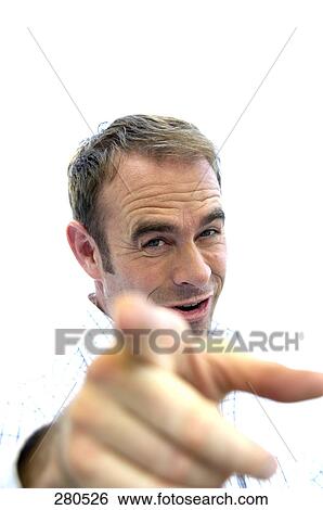 Portrait of mature man pointing View Large Photo Image Stock Photograph - Portrait of mature man pointing . Fotosearch
