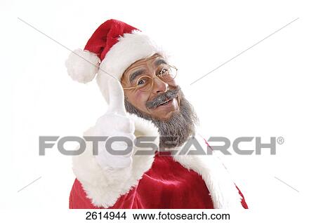 Picture - Portrait of senior man in santa costume making thumbs up sign . Fotosearch