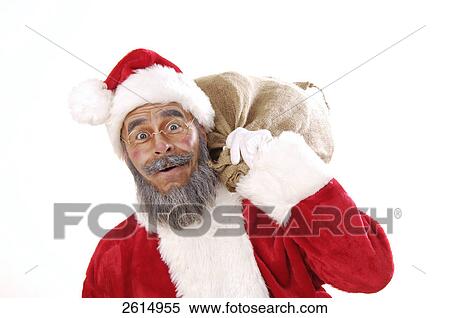 Portrait of senior man in santa costume carrying baggage  View Large Photo Image Stock Photography - Portrait of senior man in santa costume carrying baggage . Fotosearch