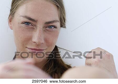 Portrait of young woman smiling View Large Photo Image Stock Photograph - Portrait of young woman smiling . Fotosearch