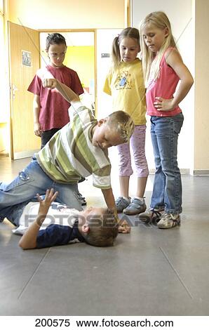 Pupils having fight View Large Photo Image Stock Photography - Pupils having fight . Fotosearch