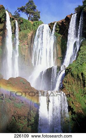 Stock Photo - Rainbow in front of waterfall, Ouzoud Falls, Azilal, Morocco . Fotosearch