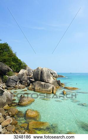 Stock Photograph - Rocky coast, Coral Cove, Ko Samui, Thailand . Fotosearch