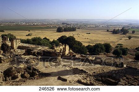 Stock Photograph - Ruins of mosque viewed from Moorish castle, Madinat al-Zahra, Cordoba, Andalusia, Spain . Fotosearch