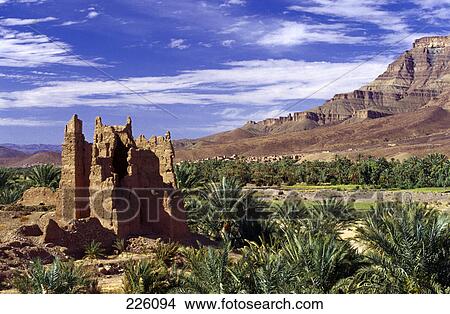 Picture - Ruins on arid landscape, Atlas Mountains, Draa Valley, Morocco . Fotosearch