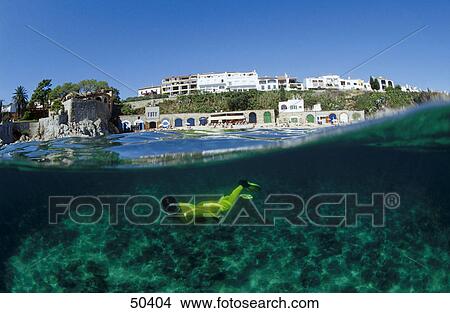 Scuba diver swimming underwater, Costa Brava, Spain View Large Photo Image Picture - Scuba diver swimming underwater, Costa Brava, Spain . Fotosearch