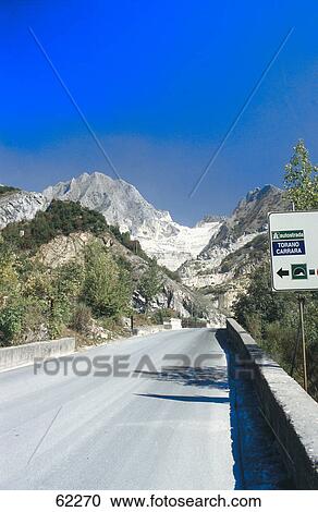 Signboard on roadside, Carrara, Tuscany, Italy View Large Photo Image Stock Image - Signboard on roadside, Carrara, Tuscany, Italy . Fotosearch