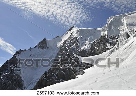 Stock Image - Snow covered mountain range, Sulden, Ortles, Trentino-Alto Adige, Italy . Fotosearch
