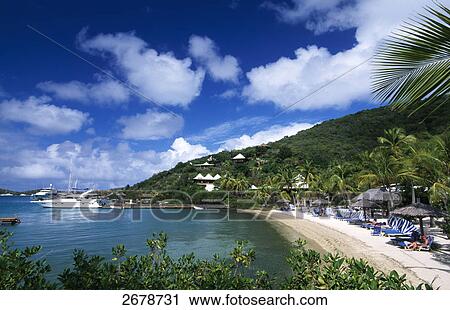 Stock Image - Sunshade on the beach, Bitter End Yacht Club, Virgin Gorda, British Virgin Islands . Fotosearch