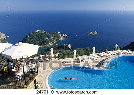 Swimming pool at seaside, Corfu, Ionian Islands, Greece View Large Photo Image Stock Image - Swimming pool at seaside, Corfu, Ionian Islands, Greece . Fotosearch
