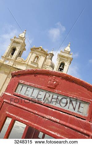 Telephone cell with cathedral in the back, ZEbbug, Malta View Large Photo Image Stock Photography - Telephone cell with cathedral in the back, ZEbbug, Malta . Fotosearch