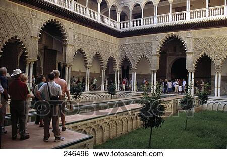 Stock Photograph - Tourists at courtyard of palace, Alhambra, Granada, Andalusia, Spain . Fotosearch