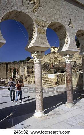 Tourists at ruins of mosque, Madinat al-Zahra, Cordoba, Andalusia, Spain  View Large Photo Image Stock Image - Tourists at ruins of mosque, Madinat al-Zahra, Cordoba, Andalusia, Spain . Fotosearch