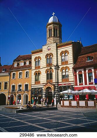 Tourists in front of old merchant house, Piata Sfatului, Brasov, Transylvania, Romania View Large Photo Image Stock Photograph - Tourists in front of old merchant house, Piata Sfatului, Brasov, Transylvania, Romania . Fotosearch