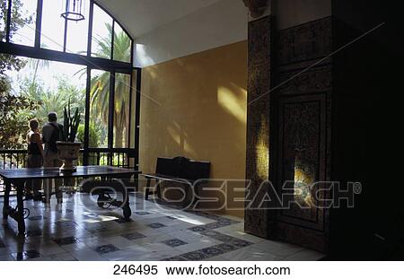 Stock Photography - Tourists in palace, Alcazar Palace, Seville, Seville Province, Andalusia, Spain . Fotosearch