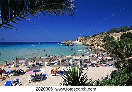 Tourists on beach, Cala Tarida, Ibiza, Balearic Islands, Spain View Large Photo Image Stock Photograph - Tourists on beach, Cala Tarida, Ibiza, Balearic Islands, Spain . Fotosearch