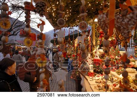 Tourists shopping at market stall during Christmas View Large Photo Image Stock Image - Tourists shopping at market stall during Christmas . Fotosearch