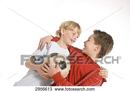 two boys with a football View Large Photo Image Stock Image - two boys with a football . Fotosearch