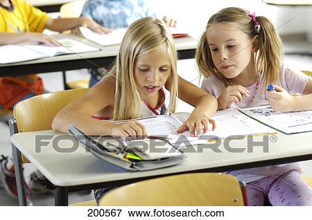 Two girls sitting in elemantary school View Large Photo Image Stock Photo - Two girls sitting in elemantary school . Fotosearch