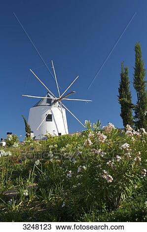 Stock Image - Wind mill, Castro Marim, Algarve, Portugal . Fotosearch