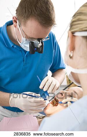 Stock Photography - Woman at dentist . Fotosearch
