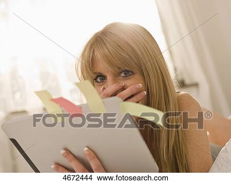 Young woman with Tablet PC in bed View Large Photo Image Picture - Young woman with Tablet PC in bed . Fotosearch