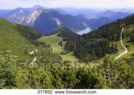Aerial view of lake surrounded by mountains, Walchensee Lake, Bavaria, Germany View Large Photo Image Stock Image - Aerial view of lake surrounded by mountains, Walchensee Lake, Bavaria, Germany . Fotosearch