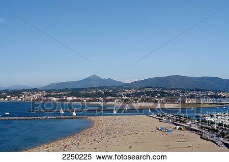 Beach with mountains in background, Hondarribia, Guipuzcoa, Basque Province, Spain View Large Photo Image Stock Photography - Beach with mountains in background, Hondarribia, Guipuzcoa, Basque Province, Spain . Fotosearch