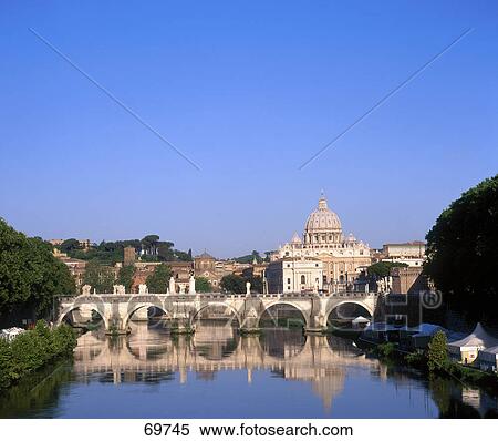 Bridge across river with church in background, St. Peter's Cathedral, Tiber River, Ponte Sant'Angelo, Rome, Italy View Large Photo Image Stock Photography - Bridge across river with church in background, St. Peter's Cathedral, Tiber River, Ponte Sant'Angelo, Rome, Italy . Fotosearch