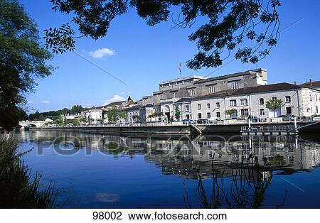 Stock Image - Buildings at waterfront, Charentes, France . Fotosearch